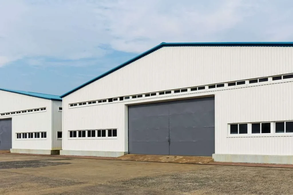 A large white garage or workshop in New Orleans